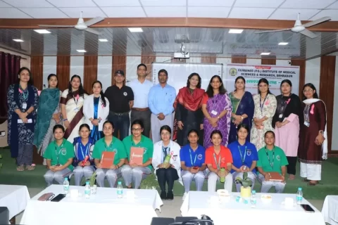 Group photo of dignitaries and faculty with Dr Sumita Prabhakar at World Breastfeeding Week program