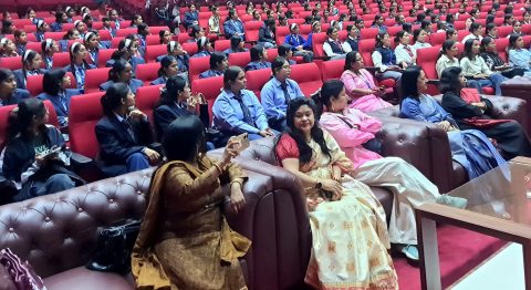 Students attending breast cancer awareness session